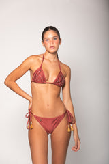 Composed of: 80% Nylon, 20% Spandex. Fits true to size. Hand wash only. Handcrafted.